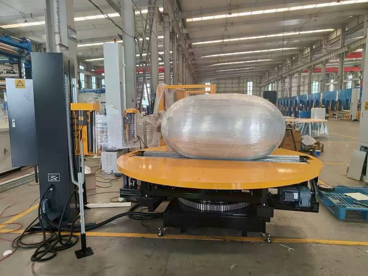 Heavy roll sealed on a turntable cell